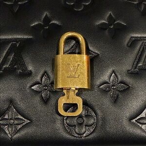 Louis Vuitton Gold Lock on Black Leather